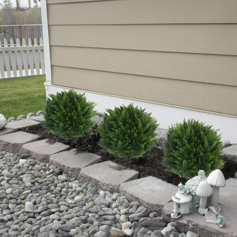 Artificial cedar topiary outdoor setting